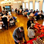 Volunteers enjoy a meal at awards dinner