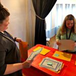 Head librarians sort through volunteer certificates
