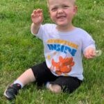 Child in SRC t-shirt