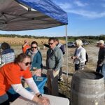 Attendees check-in at Raise a Glass to Reading
