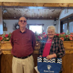 librarian poses with volunteer