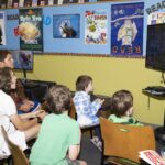group of teens playing super Mario smash on the Switch