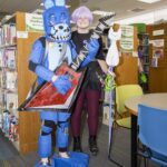 Teen in five nights at Freddys costume poses
