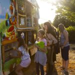 teen picks snow cone flavor