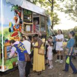 teens in line to get snow cones