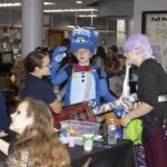 teens converse with librarian Sarah M