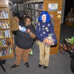 Khellie B poses with costume contest winner Coraline
