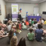kids enjoy magic show