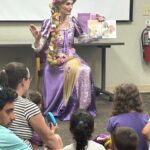 Princess Rapunzel reads a picture book