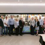 GCPL Staff, construction admin, architects, pose in front of Spark Place