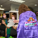 teens picking up their swag bags