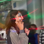 teen with face paint enjoying silent disco