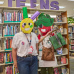 Teens dressed up as fruit with homemade lemon and strawberry masks