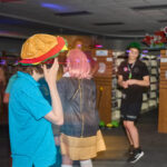 teens dance in silent disco area