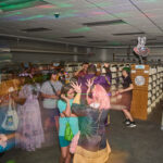 teens dance in silent disco area