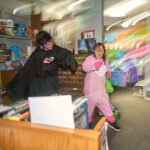 teens dance in silent disco area