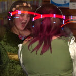 Teen girls sing along during silent disco