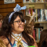 dressed up teen smiles