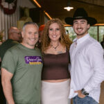 family posing together and smiling