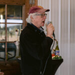 man speaking into microphone
