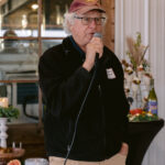 man speaking into microphone