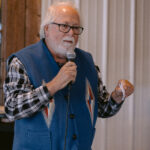 auctioneer speaking into microphone
