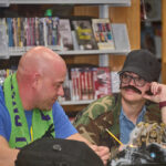 two patrons playing trivia