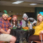 trivia group all dressed up in wizard of oz masks