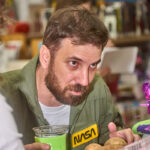 man holding a drink