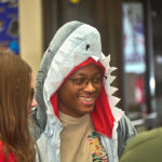 man wearing shark hoodie
