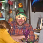 patron with a halloween mask