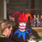 patron dressed up as a spooky jester